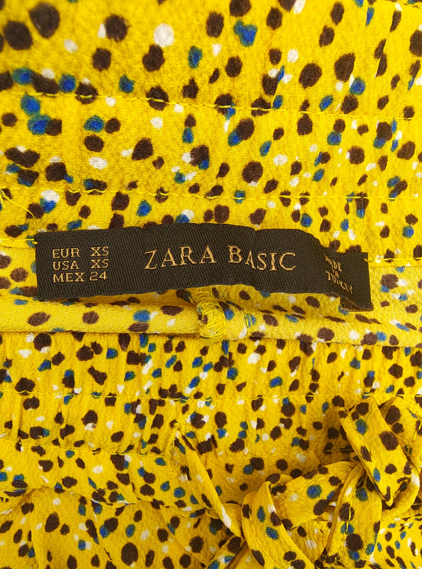 USADO – Pantalón fluido amarillo con estampado de lunares ZARA BASIC (Talla EUR XS)
