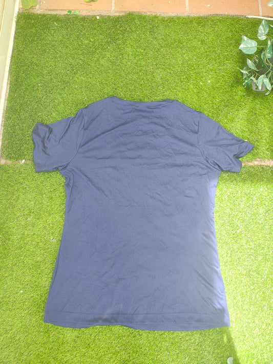 USADO – Camiseta deportiva azul marino con logo “Miami” SPORT-TEK (Talla M)