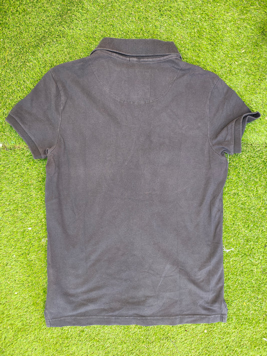 USADO – Polo negro clásico HOLLISTER con logo azul (Talla XS)
