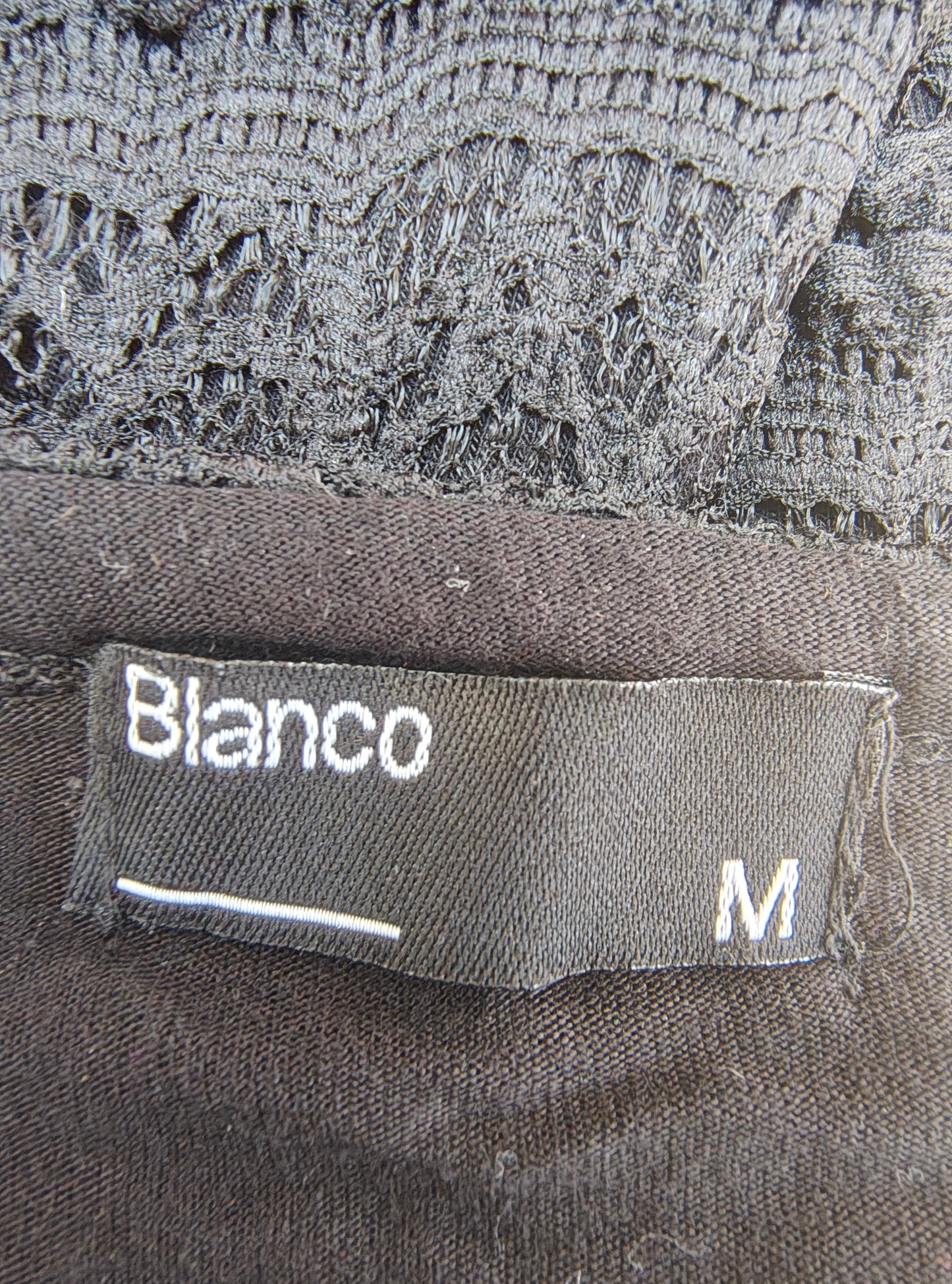 D'OCCASION – Robe en dentelle noire avec nœud BLANC sur le devant (Taille M)