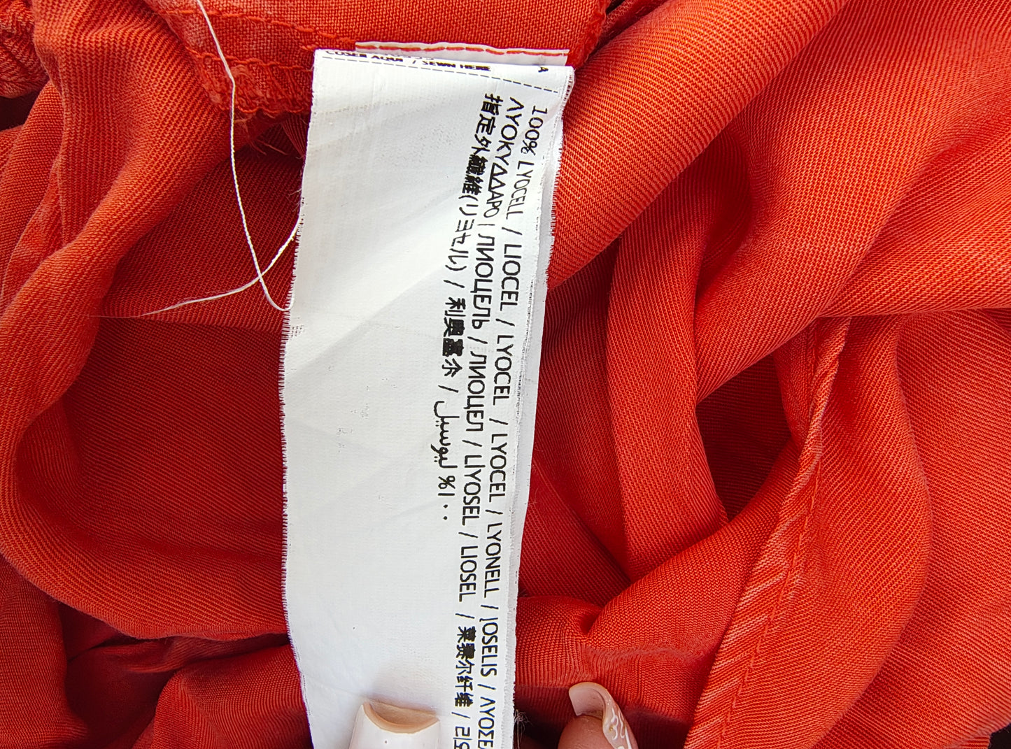 USADO – Top naranja con escote elástico y volante de MANGO Casual (Talla S)