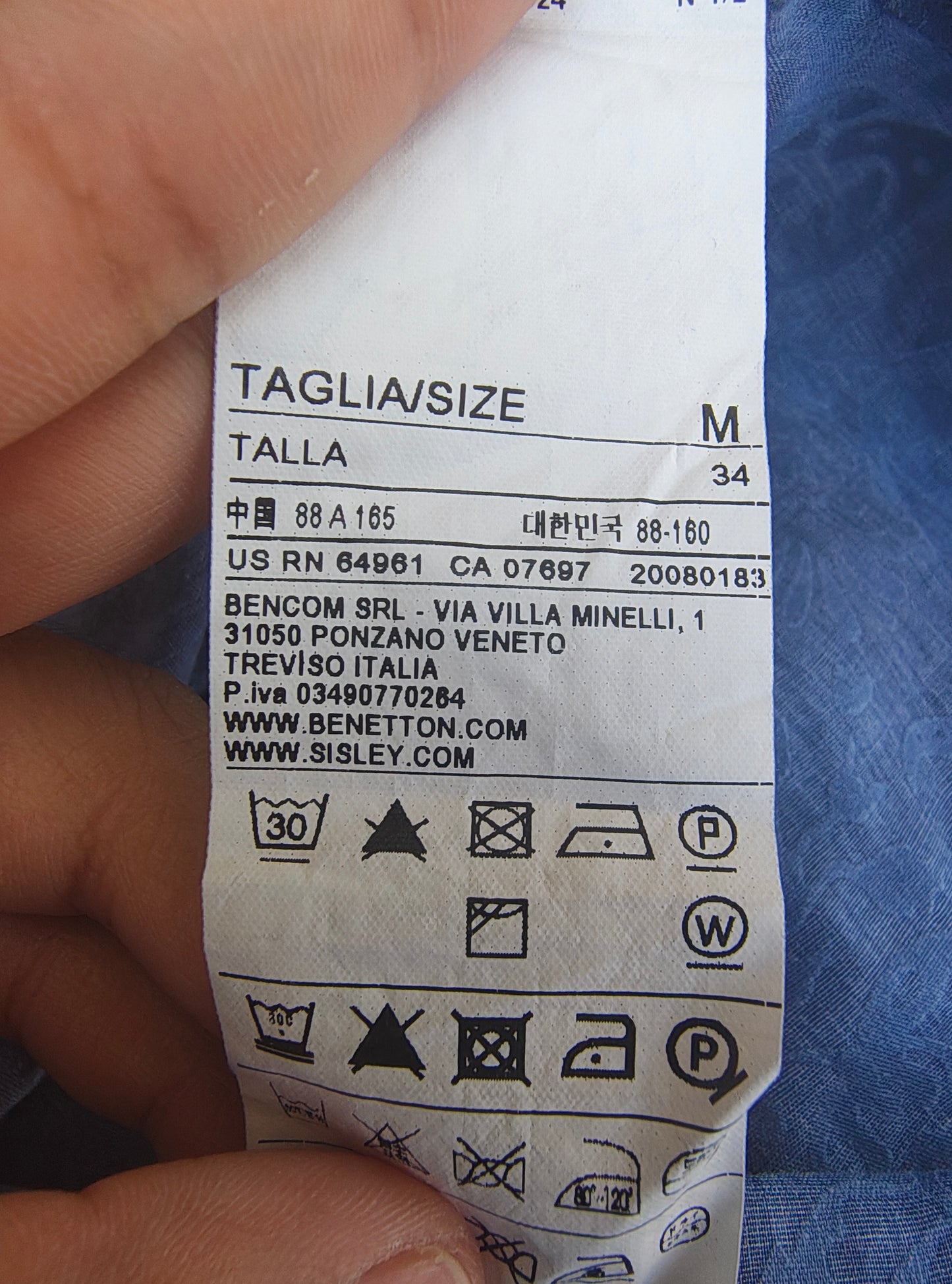 USADO – Top azul con volantes en cuello y espalda descubierta STILE BENETTON (Talla M)