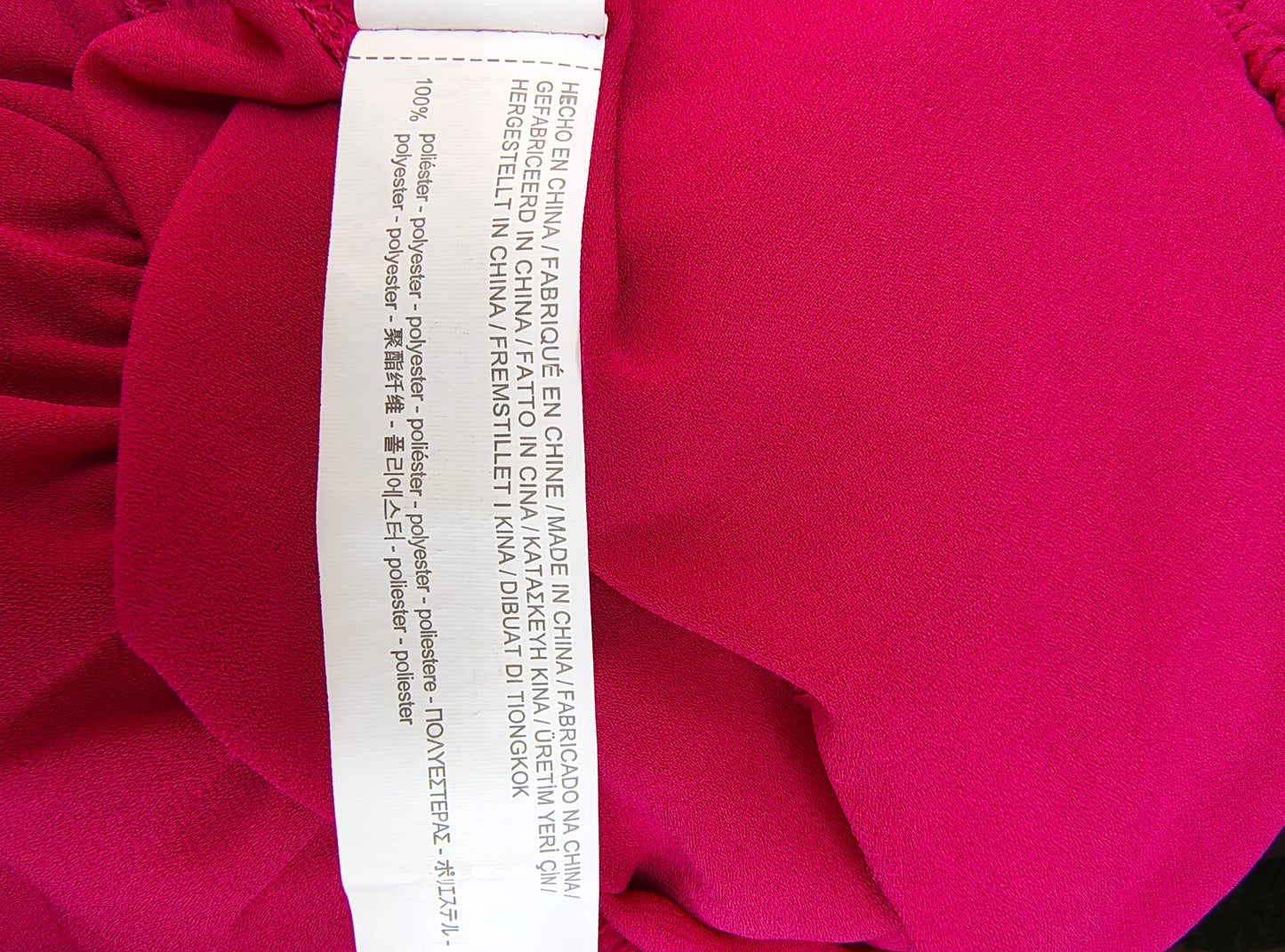USADO – Top fucsia con volantes en hombros STRADIVARIUS (Talla L)