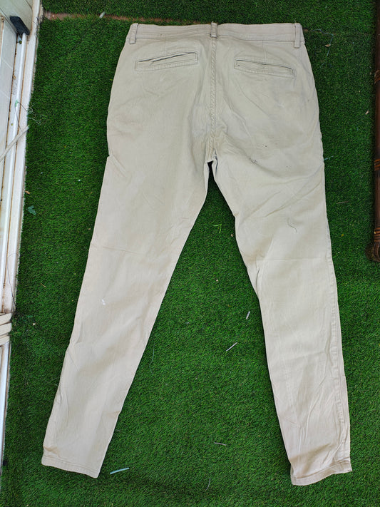 USADO – Pantalones chinos beige LEFTIESMAN (Talla EUR 38)