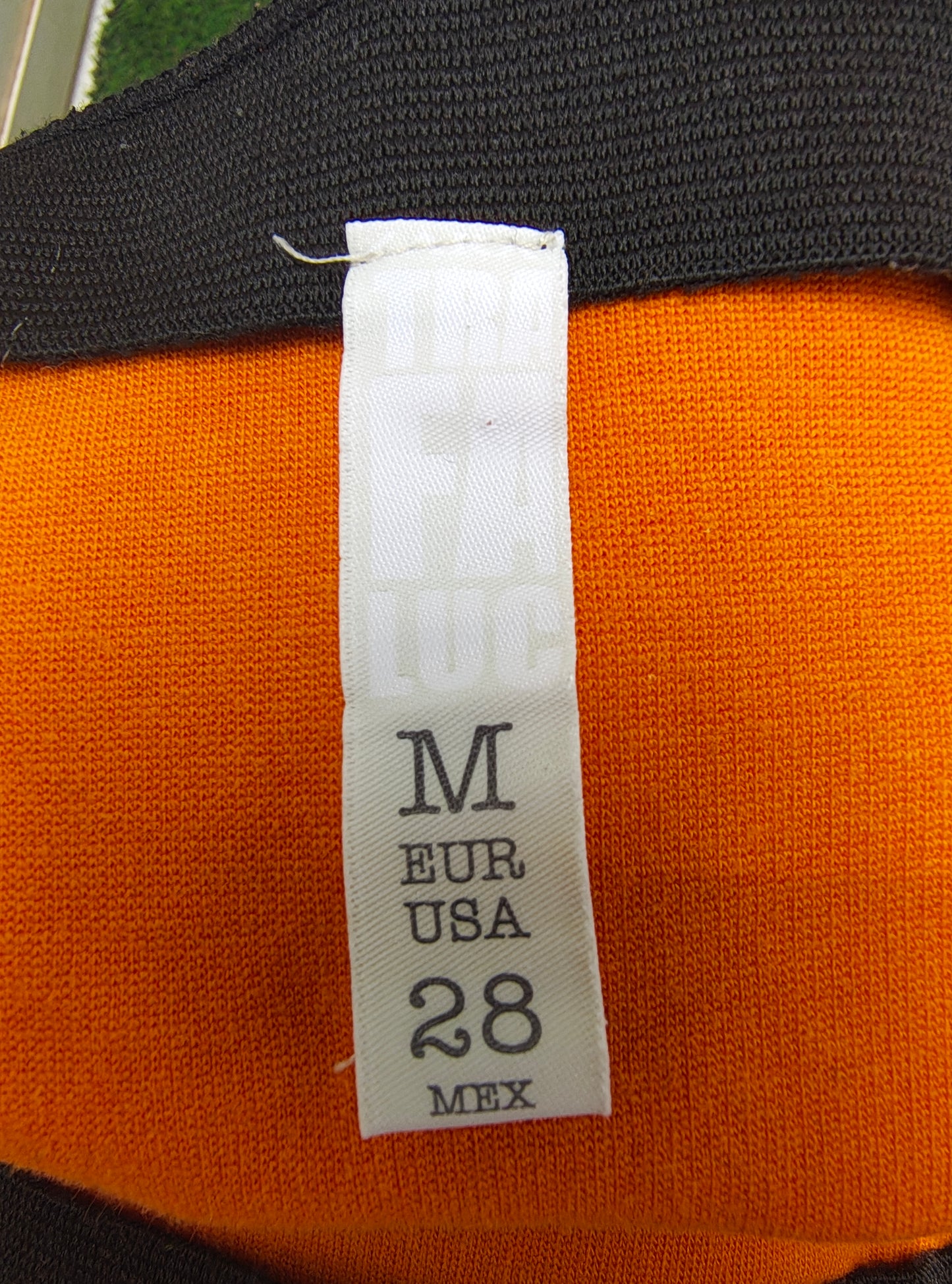 USADO – Falda tubo elástica en naranja liso (Talla EUR M)